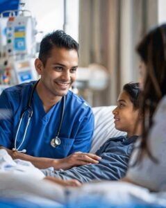 Articles Male Nurse Talking to kid client