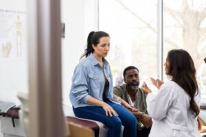 Doctor consulting patient